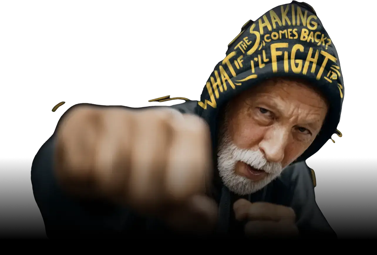 A man dressed in a hoodie punches towards the camera. The text on his hood reads "What if the shaking comes back? I'll fight it."